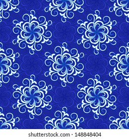 Swirly floral snowflakes seamless pattern.