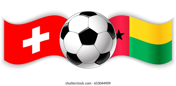 Swiss and Bissau-Guinean wavy flags with football ball. Switzerland combined with Guinea-Bissau isolated on white. Football match or international sport competition concept.