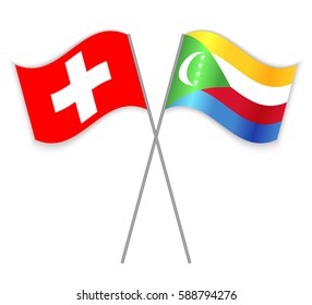 Swiss and Comoran crossed flags. Switzerland combined with Comoros isolated on white. Language learning, international business or travel concept.