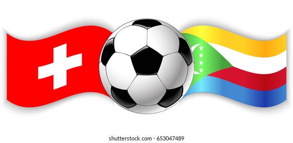 Swiss and Comoran wavy flags with football ball. Switzerland combined with Comoros isolated on white. Football match or international sport competition concept.