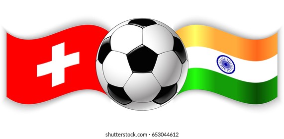 Swiss and Indian wavy flags with football ball. Switzerland combined with India isolated on white. Football match or international sport competition concept.