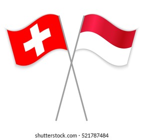 Swiss and Monegasque crossed flags. Switzerland combined with Monaco isolated on white. Language learning, international business or travel concept.