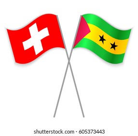 Swiss and Sao Tomean crossed flags. Switzerland combined with Sao Tome and Principe isolated on white. Language learning, international business or travel concept.