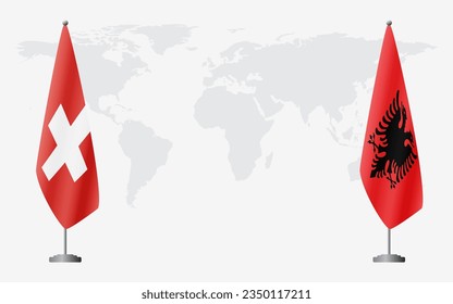 Switzerland and Albania flags for official meeting against background of world map.