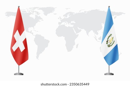 Switzerland and Guatemala flags for official meeting against background of world map.