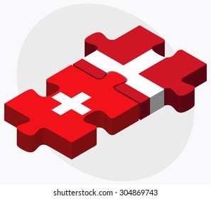 Switzerland and Kingdom of Denmark Flags in puzzle isolated on white background
