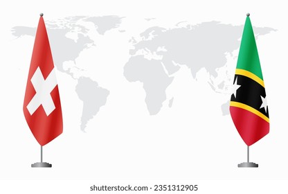 Switzerland and Saint Kitts and Nevis flags for official meeting against background of world map.