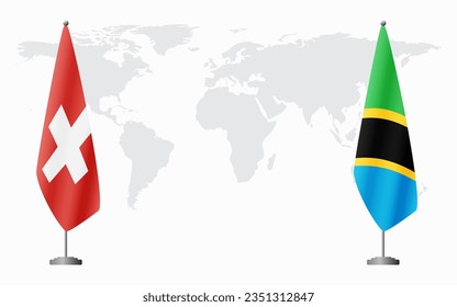 Switzerland and Tanzania flags for official meeting against background of world map.