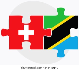 Switzerland and Tanzania Flags in puzzle isolated on white background
