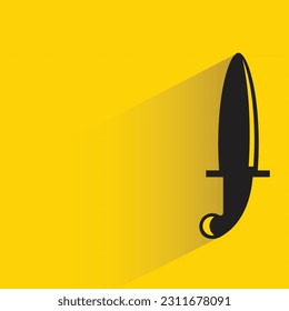 sword with shadow on yellow background