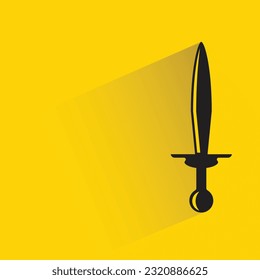 sword with shadow on yellow background