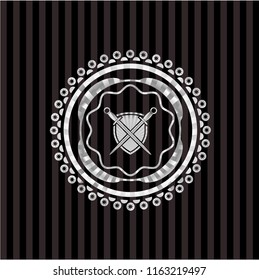 swords crossed with shield icon inside silver badge or emblem