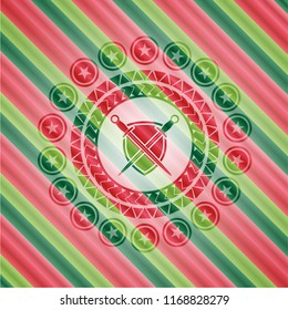 swords crossed with shield icon inside christmas badge.
