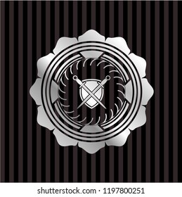 swords crossed with shield icon inside silver badge or emblem