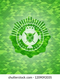 swords crossed with shield icon inside green mosaic emblem