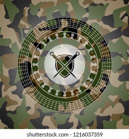 swords crossed with shield icon inside camo emblem