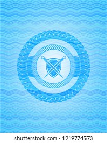 swords crossed with shield icon inside water concept badge.