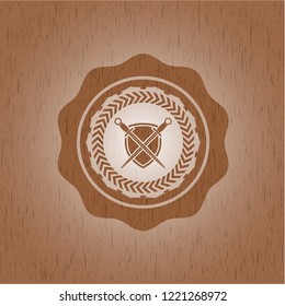 swords crossed with shield icon inside wood signboards