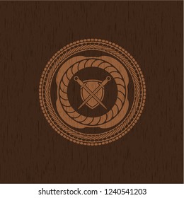 swords crossed with shield icon inside retro style wooden emblem