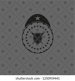 swords crossed with shield icon inside black emblem