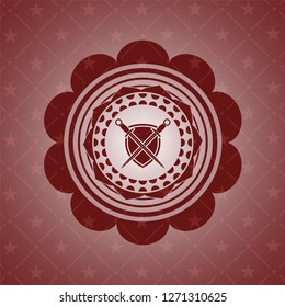 swords crossed with shield icon inside red emblem