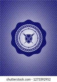 swords crossed with shield icon inside emblem with denim high quality background