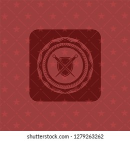 swords crossed with shield icon inside badge with red background