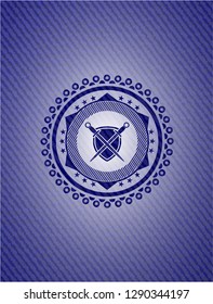 swords crossed with shield icon inside emblem with jean background