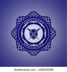 swords crossed with shield icon inside emblem with denim high quality background