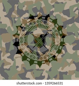 swords crossed with shield icon inside camo texture