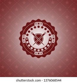 swords crossed with shield icon inside red emblem