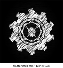 swords crossed with shield icon inside chalkboard emblem