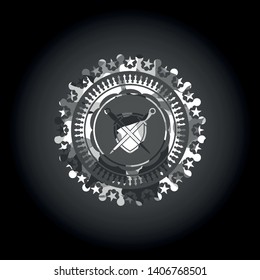 swords crossed with shield icon inside grey camouflaged emblem