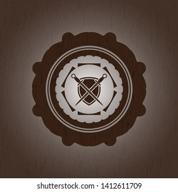 swords crossed with shield icon inside wooden emblem. Retro