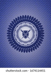 swords crossed with shield icon inside emblem with denim high quality background