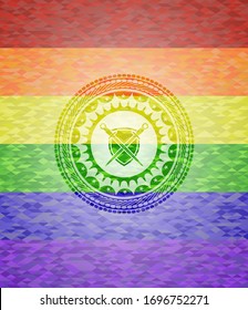 swords crossed with shield icon inside emblem on mosaic background with the colors of the LGBT flag