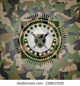 swords crossed with shield icon on camouflaged texture