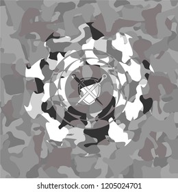swords crossed with shield icon on grey camouflaged texture