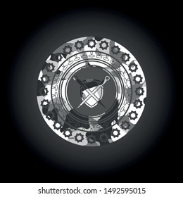 swords crossed with shield icon on grey camouflage texture