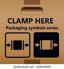 The symbol CLAMP HERE for use on boxes, packages and parcels
