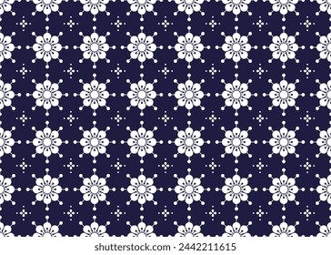 Symbol geometric white flowers design on dark blue background seamless fabric ethnic pattern for cloth carpet wallpaper wrapping etc.