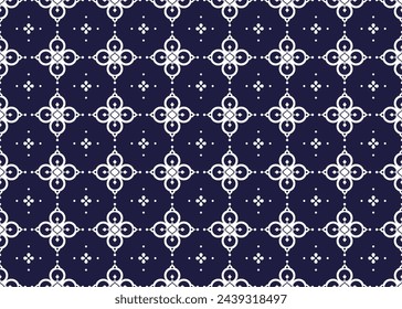 Symbol geometric white flowers on dark blue background seamless fabric ethnic pattern for cloth carpet wallpaper wrapping etc.