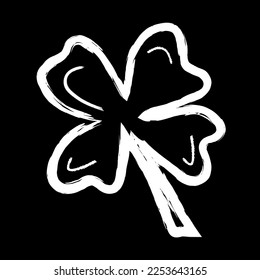 The symbol of good luck is a clover leaf with four petals. St. Patrick's Day. A plant element in the style of doodles. Drawing with chalk on the blackboard. Vector illustration in white on black