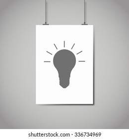 symbol of idea bulb hanging on a piece of paper