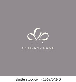 A symbol or logo of a simple, minimalistic, stylized flower or bow shape, consisting of several elements. Made with a curving line.
