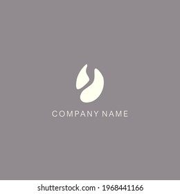 A symbol or logo of a simple, minimalistic, stylized flower bud or blob shape, consisting of two elements. Made with a spot. Vector illustration