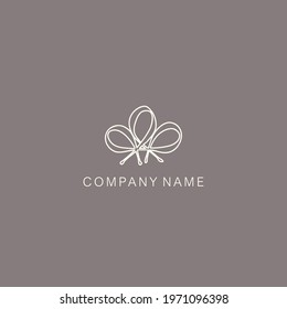 A symbol or logo of a simple, minimalistic, stylized flower shape, consisting of several elements. Made with a thin contour line. Vector illustration