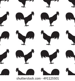 Symbol new 2017 years. Roosters. Seamless pattern. Black roosters on white background.