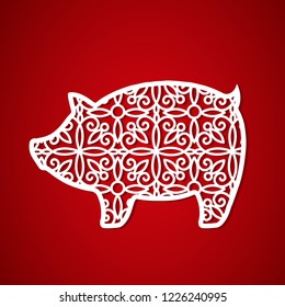 The symbol of the new year pig.  Openwork decorative template for laser cutting, plotting cutting, printing. Vector image on a red background.