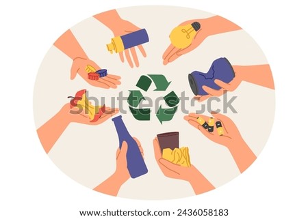 Symbol of separation and recycling of garbage among hands of people with various human waste. Concept of rubbish separation to reduce carbon footprint caused by waste incineration plants